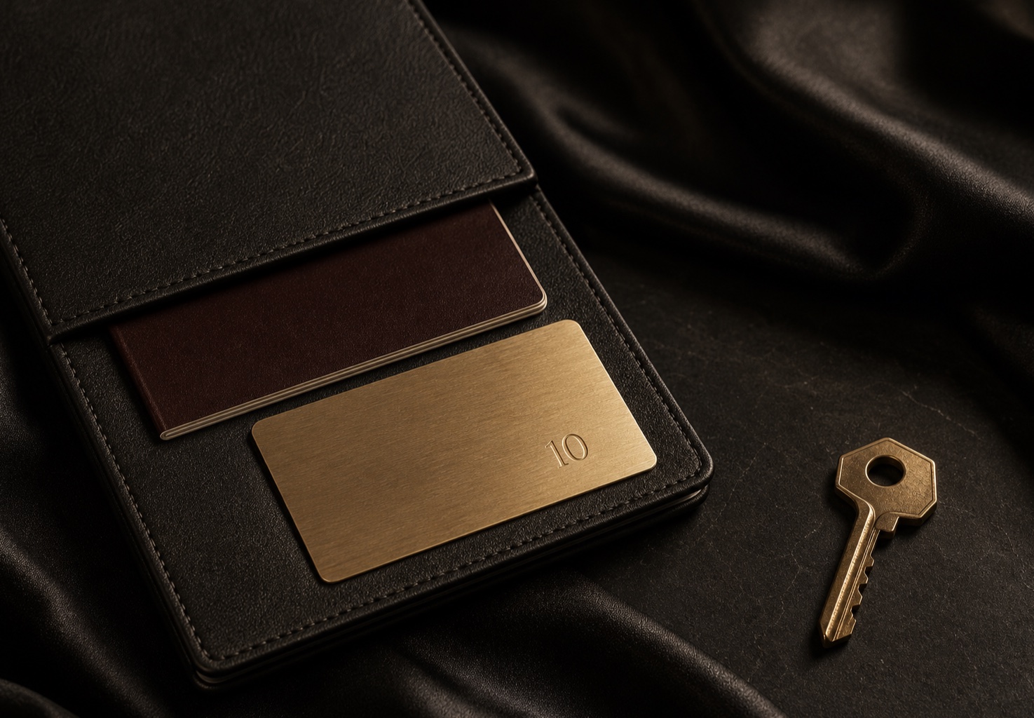 The UAE Golden Residence card beside an ivory and gold ring